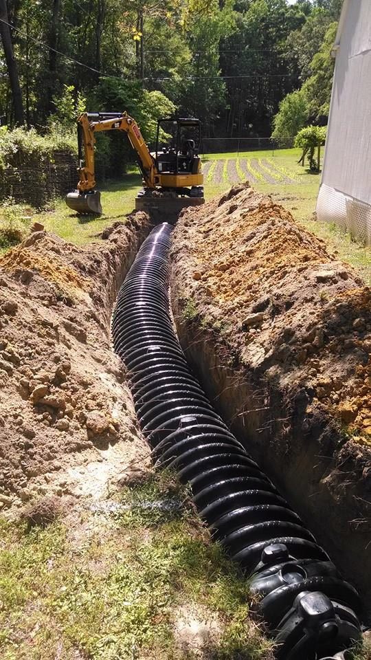 DLC Septic Systems - drainage pipe installation